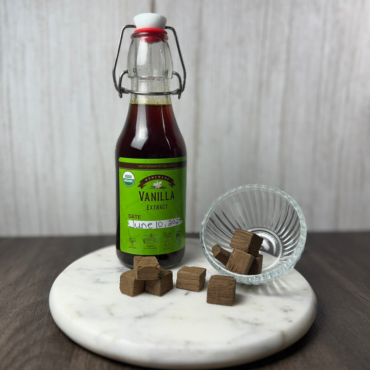 American Oak Blocks - Medium next to vanilla extract bottle