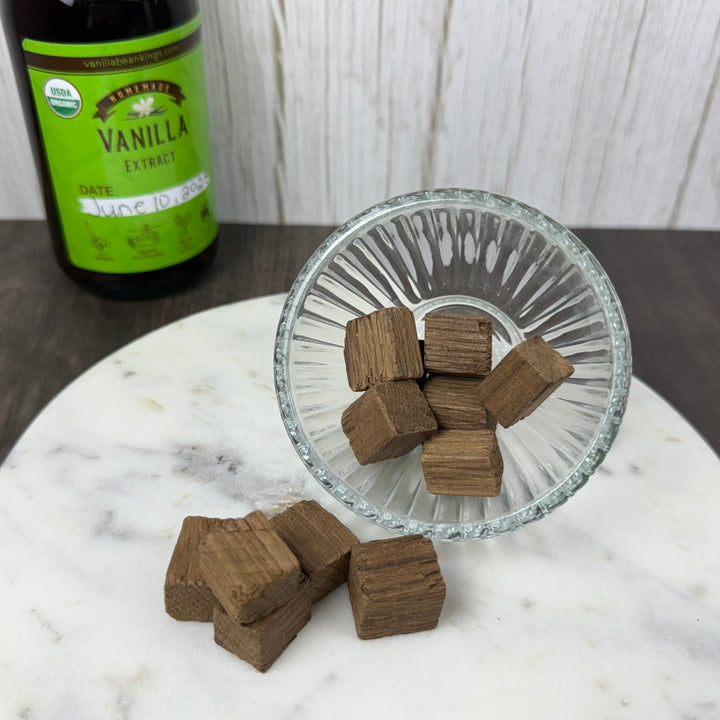 American Oak blocks - medium next to vanilla extract bottle close up