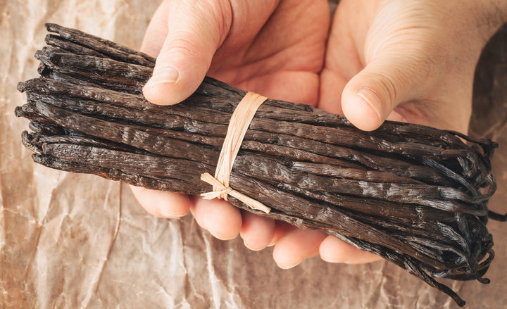 bundle of vanilla beans wrapped in rafia