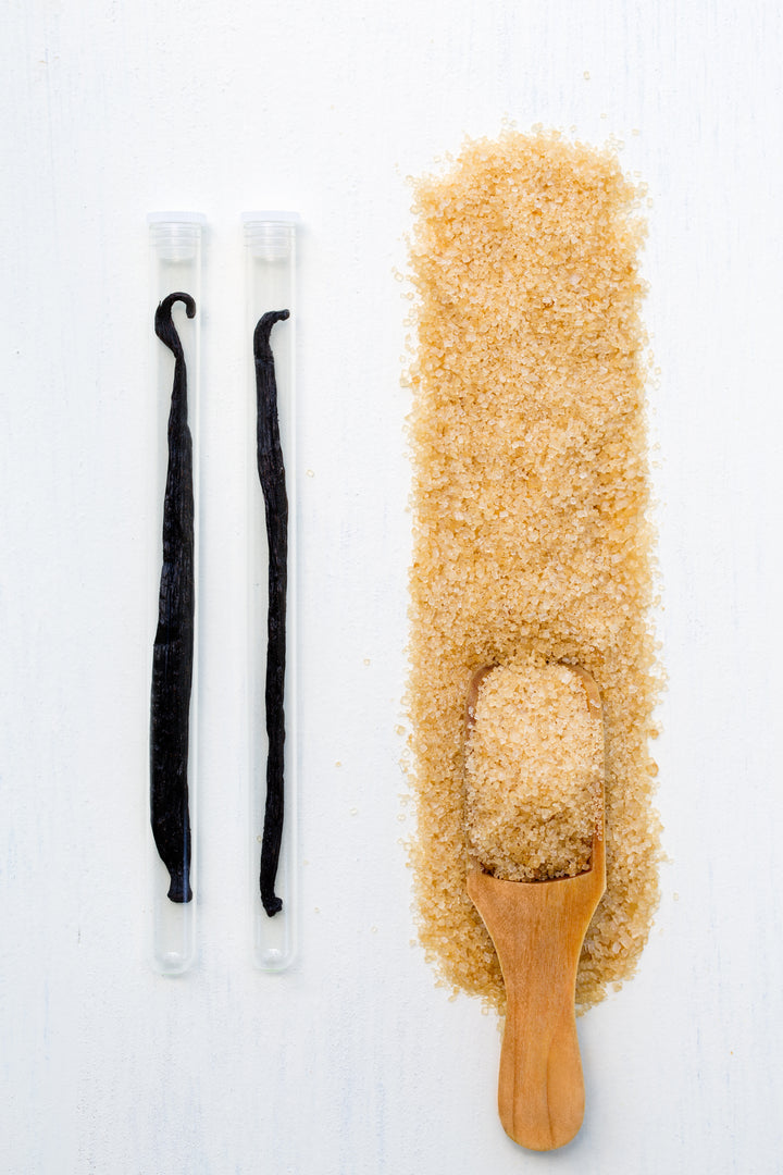 2 vanilla beans and line of sugar