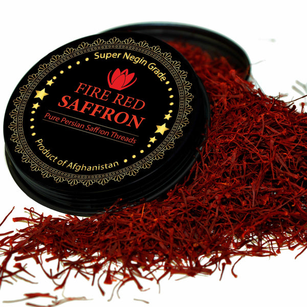 saffron threads spilling out of saffron tin