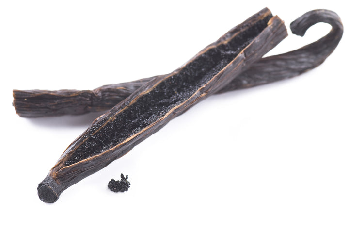 cut open vanilla bean to show the caviar inside